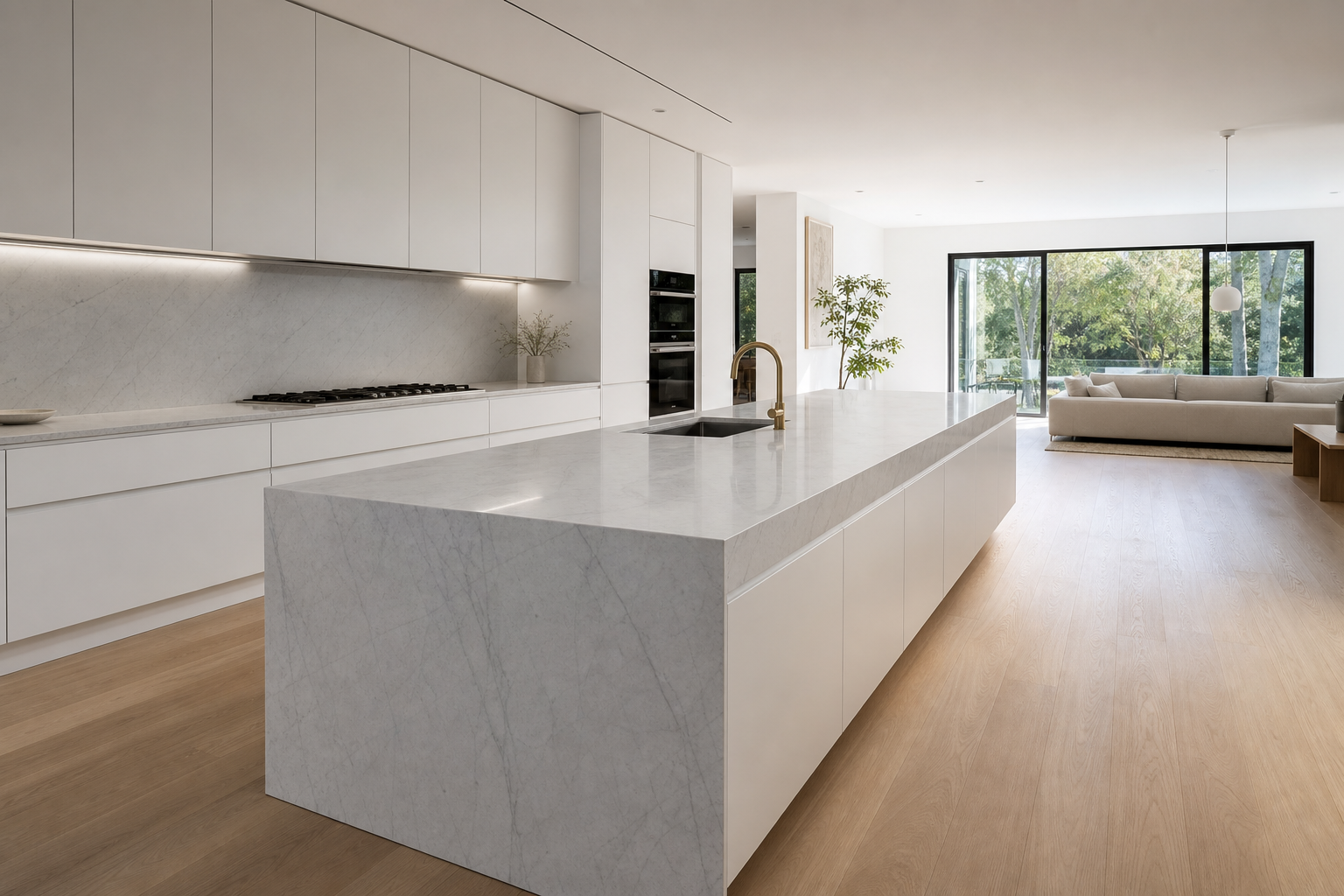 Modern white kitchen with subtle marble waterfall island
